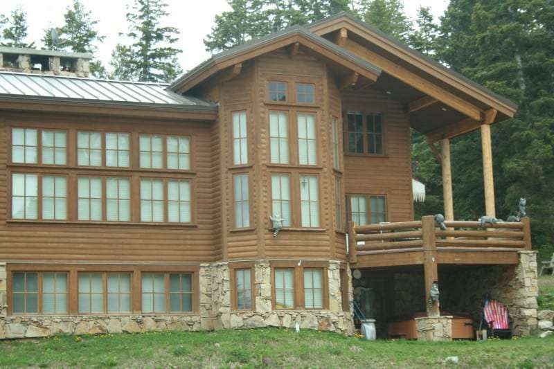 Half Log Wood Siding. Milled Logs Split in half and used as Siding
