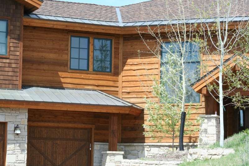 Overlapping wood Siding Natural Edge. Rustic Lodge Exterior.